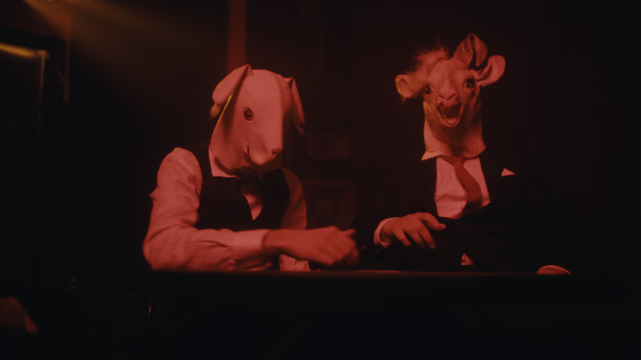 Men in Animal Masks at a Table