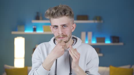 Portrait-of-nervous-and-stressed-young-man.