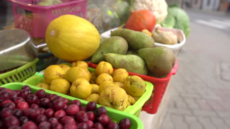 fruits and vegetables on the open market on an empty street