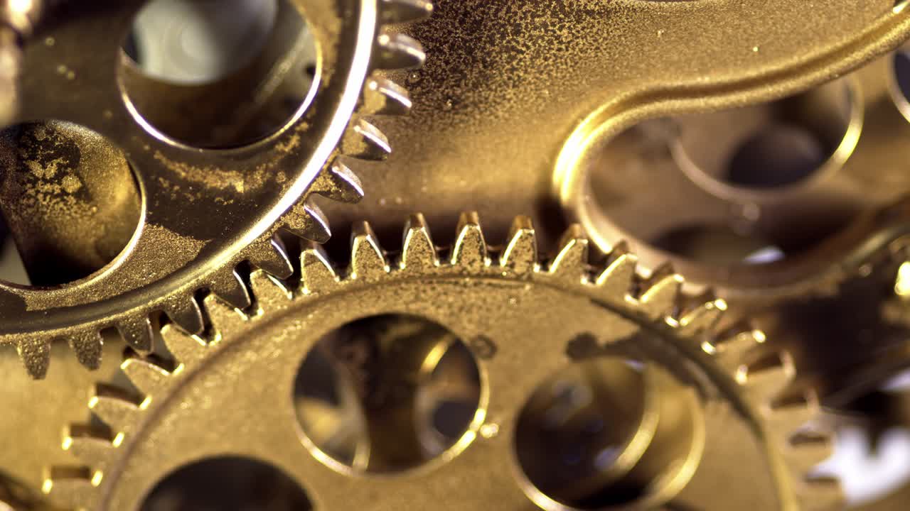 Close Up Gears Turning in Working Mechanism
