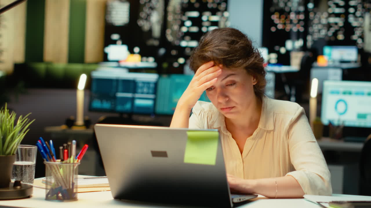 Vertical Video Business director sleepy and burdened at the office late at night
