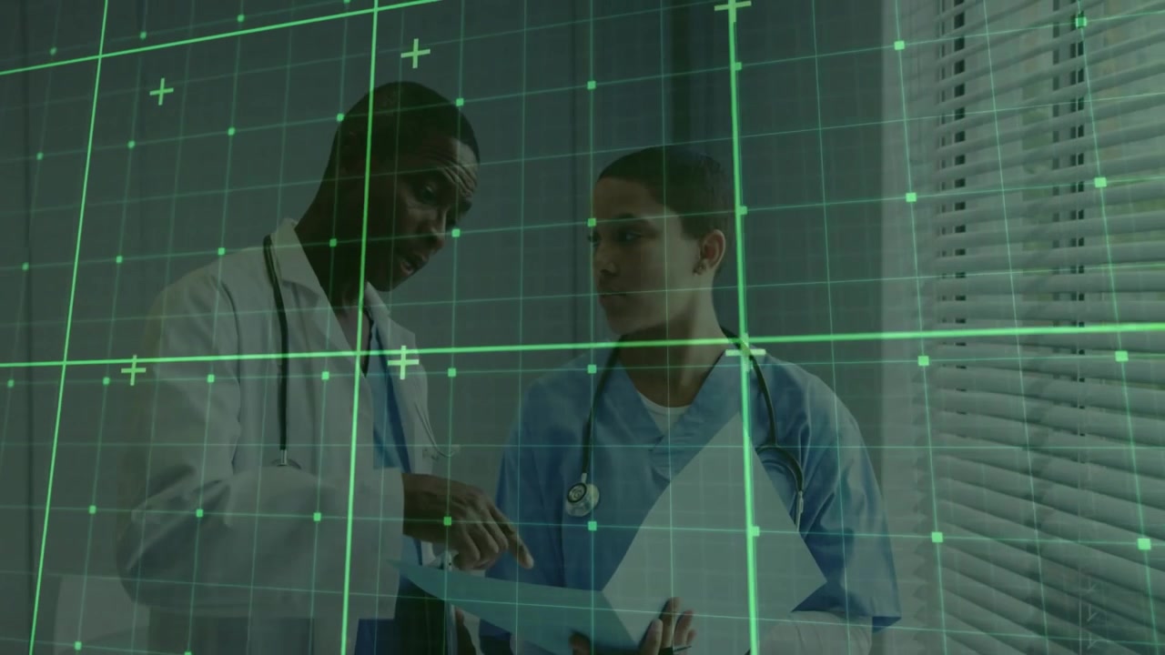 Female clinician opening chart in clinic physician leaning in pointing underlining treatment plan