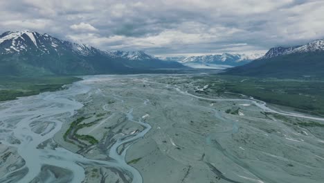 aerial view of knik river with mountain views in anchorage, alaska