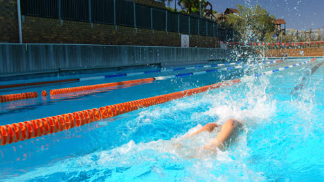 female swimmer swimming in pool 4k