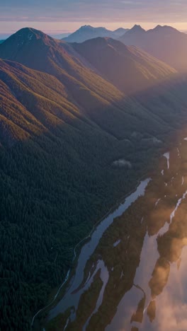 sunrise over mountain valley with river