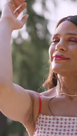 woman enjoying the sun with eyes closed
