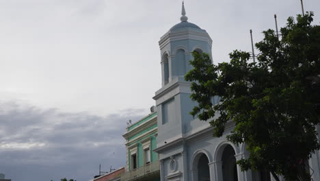 Slow-motion-shot-of-a-bird-flying-infront-of-the-Plaza-de-Armas