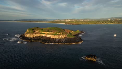 Aerial-over-Cook-Island-with-Fingal-Head-in-the-background,-Northern-New-South-Wales,-Australia