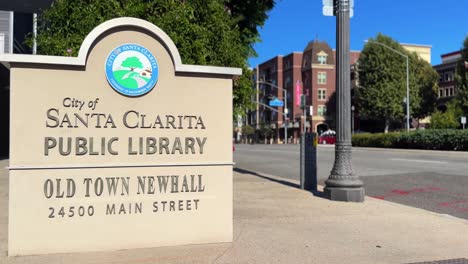view of sign at the city of santa clarita public library in old town newhall on main street