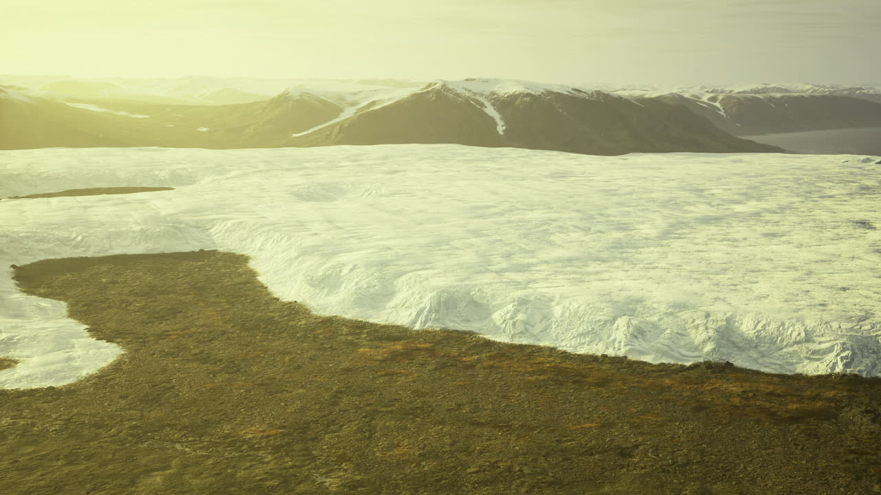 Majestic glacier landscape under golden sunlight in a remote region