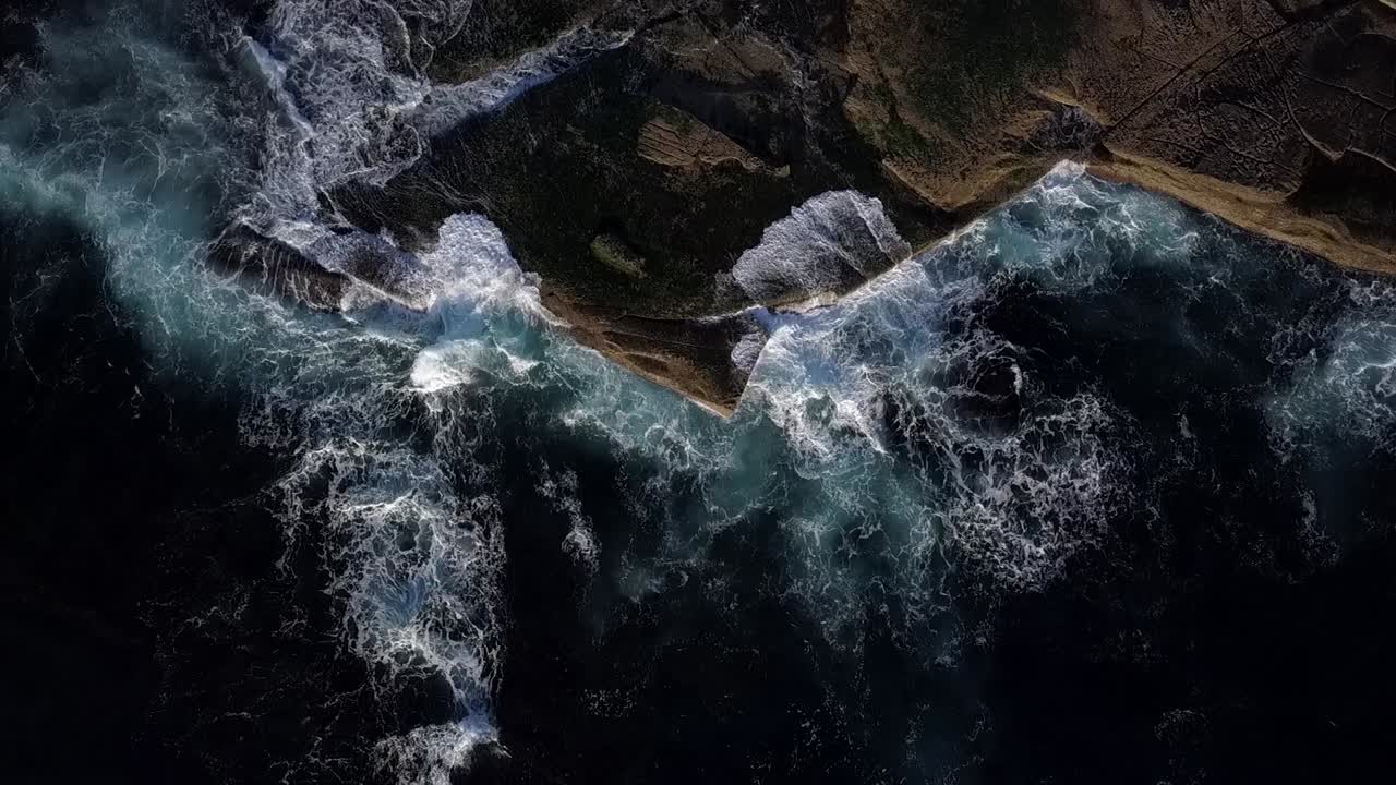 Ocean Cliff and Rock Pool Flyby rocket up - birds view from drone