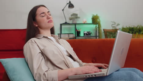Pretty young woman use laptop surprised by bad news fortune loss fail lottery results at home