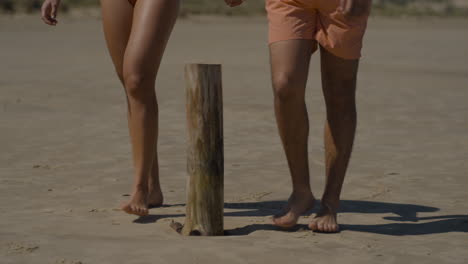 cute couple walking on the beach