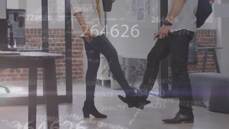 animation of data processing over diverse business people working at office