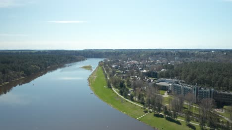 AERIAL:-Birds-Flying-over-River-Nemunas-near-Resort-Town-Birstonas