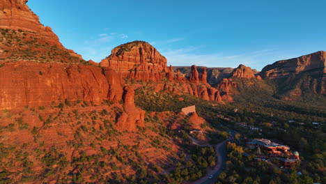 Chapel-Of-The-Holy-Cross-And-Red-Rocks-In-Sedona,-Arizona---Aerial-Drone-Shot