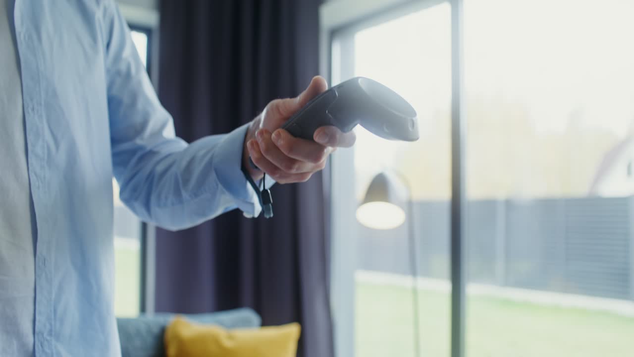 Man Holding VR Controllers