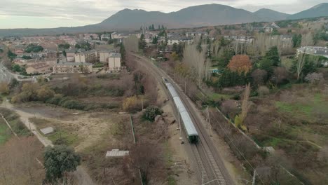 slow tracking shot of a classic train in el escorial madrid