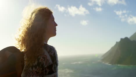 woman relaxing in countryside on a sunny day 4k