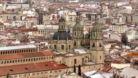 aerial view of the cathedral of salamanca in a snowy winter day