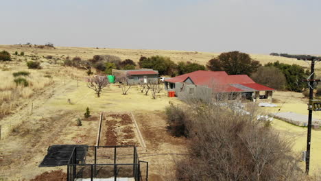 Fly-over-footage-of-a-South-African-farmhouse-in-winter