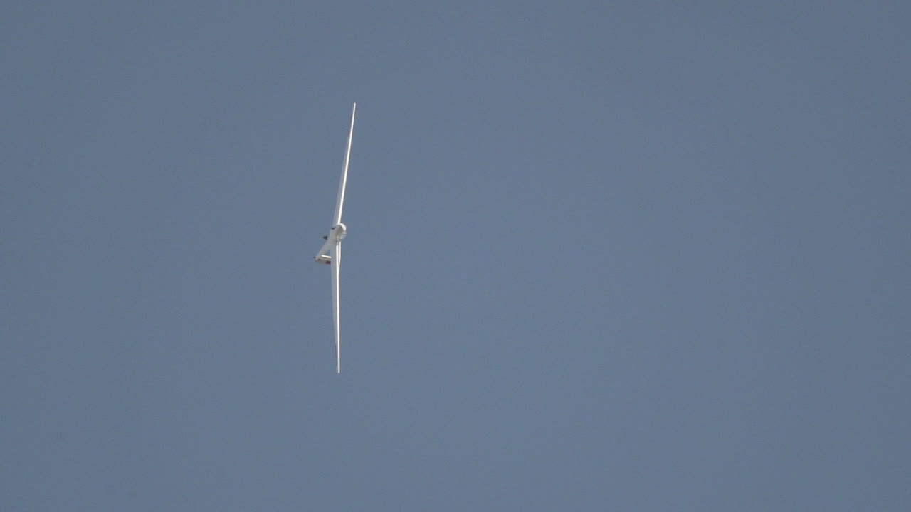 A glider enters a practice spin and recovers