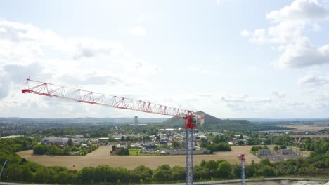 Aerial-drone-tilt-up-shot-over-a-new-construction-development-site-at-daytime