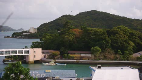 mikimoto pearl island, slow motion establishing shot of toba bay