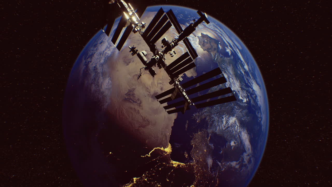 International space station orbits earth over africa at night