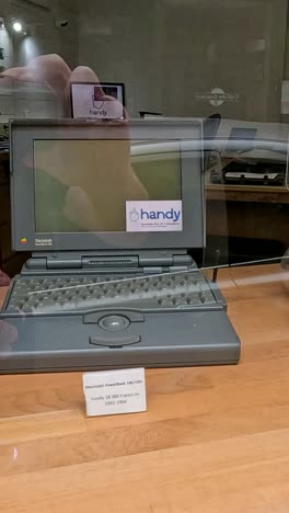 showcase of old apple computers and accessories