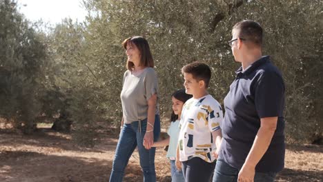 non-normative family srtolling on a rural path