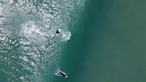 aerial drone pedestal view atlantic ocean surfer charges wave but misses