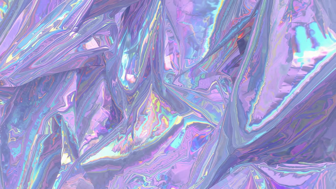 Displaying crumpled holographic metallic film reflecting pastel pink silver in studio, shifting