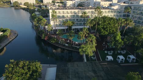 orbiting aerial establishing shot of a hotel resort in mallorca, spain