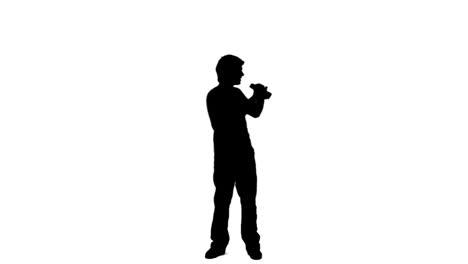 Silhouette-man-looking-through-binoculars