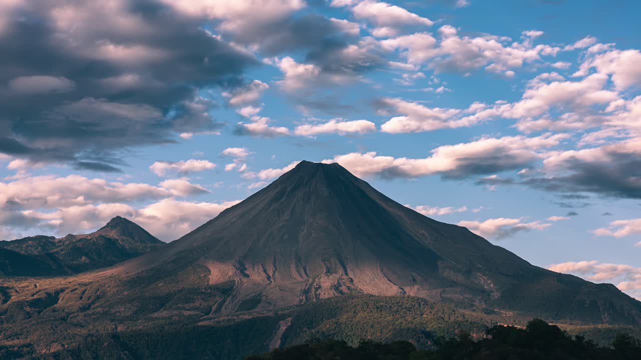 Breathtaking time-lapse over Colima's active volcano at sunset, sky ...