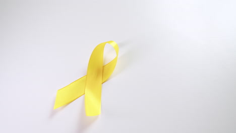 yellow ribbons signifies mainly for suicide prevention and liver disease and cancer awareness, especially in children