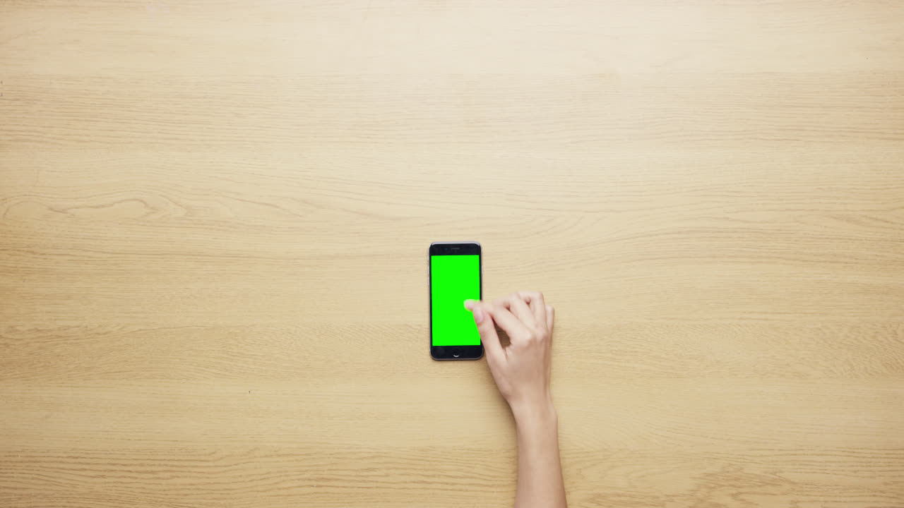 Top view female hands showing multitouch gestures green screen working at desk from above - Red Epic Dragon