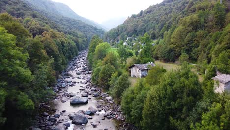 Cinematic-drone-shot-over-river-and-nature-in-italian-mountain