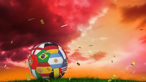 animación de confeti cayendo sobre la pelota con diversas banderas nacionales acostadas en el césped al atardecer