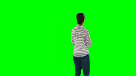 Woman-giving-a-presentation-against-green-screen-4k