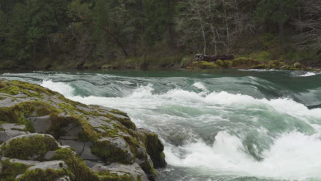 Camera-pans-over-beautiful-flowing-river