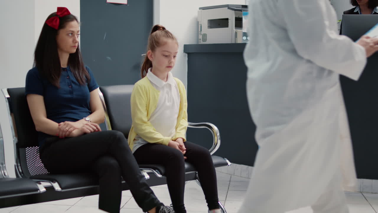 People Waiting in Hospital Waiting Room