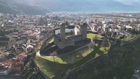 bellinzona switzerland amazing backlit castle on hilltop approaching flight