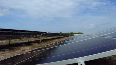 Established-static-shot-of-solar-panel-bifacial-technology-installed-in-photovoltaic-farm-in-Africa-with-blue-sunny-sky