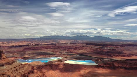 aerial view of potash mine and evaporation ponds in desert of moab, utah, usa - drone shot