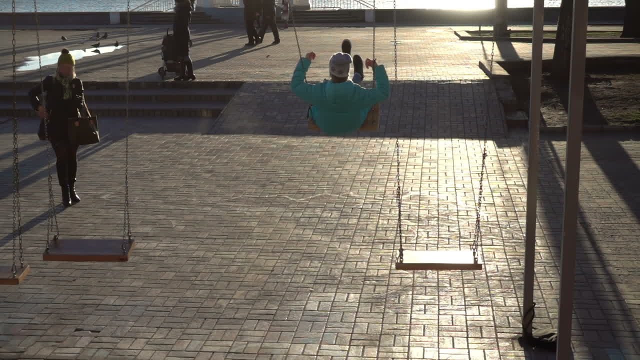 Swing for children. Slow Motion
