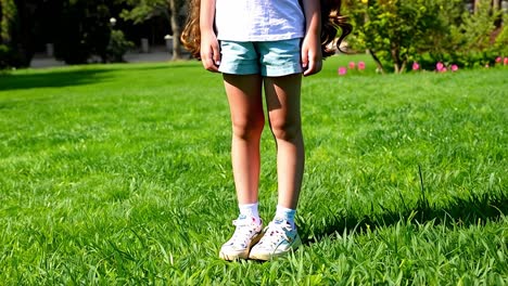 girl standing in a park