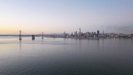 aerial hyperlapse fly in of san francisco skyline at sunrise