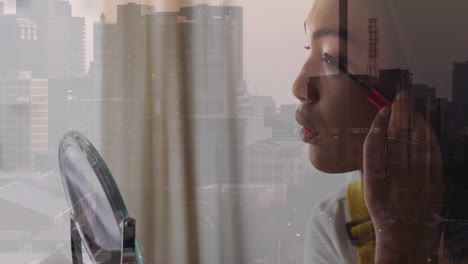 applying makeup, person with cityscape view through translucent curtain